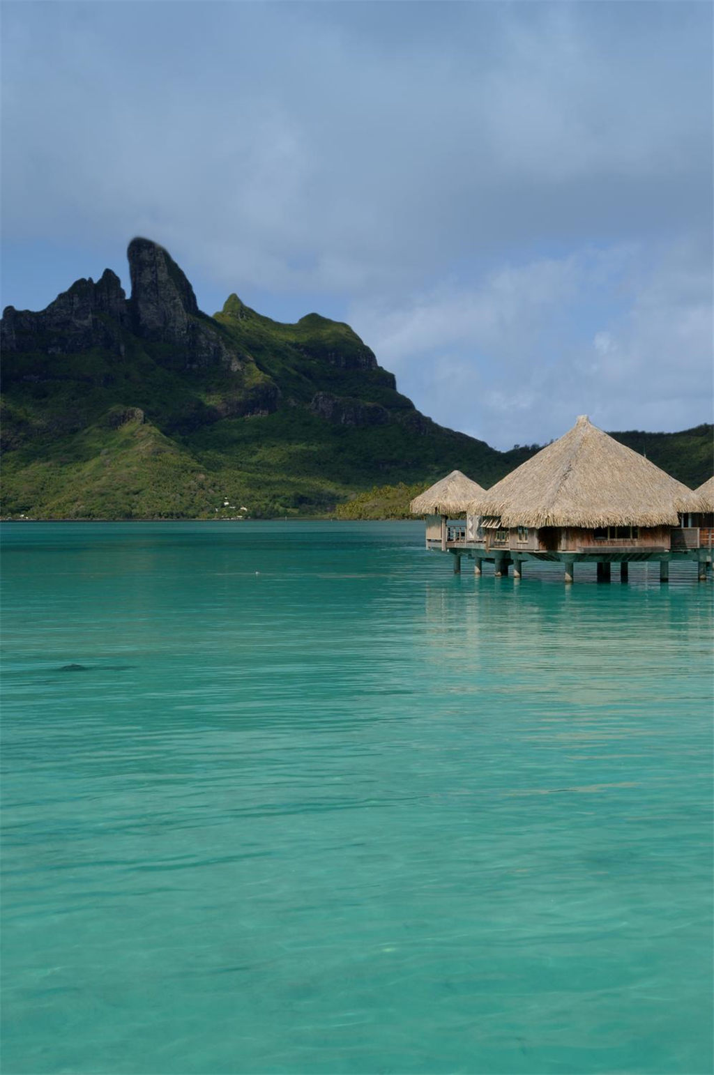 10)The St. Regis Bora Bora ResortOver water villa with backdrop of Mt. Otemanu.jpg